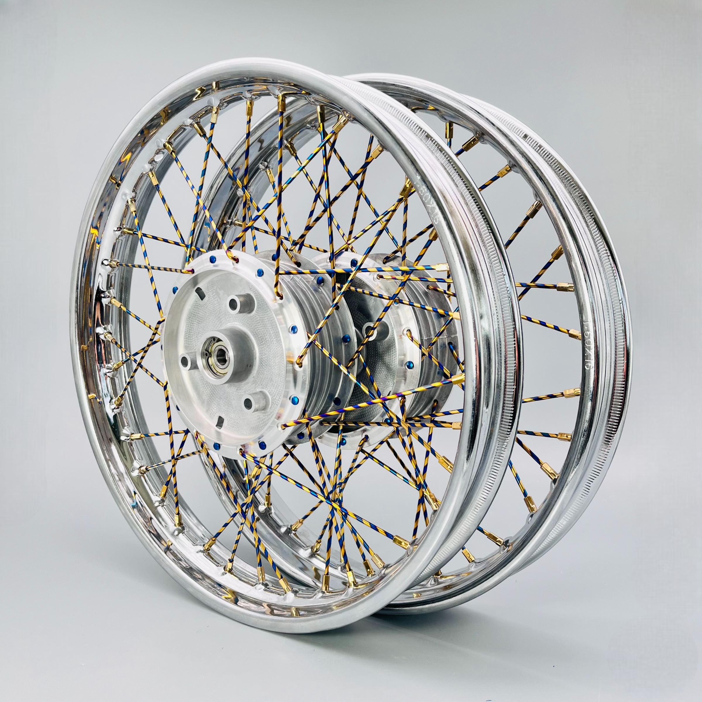 SET 2xSpeichenrad 1,6x16 Zoll Felge Stahl verchromt / Speichen Edelstahl blau-gold CandyCane Titan / Nippel Messing gold Titan