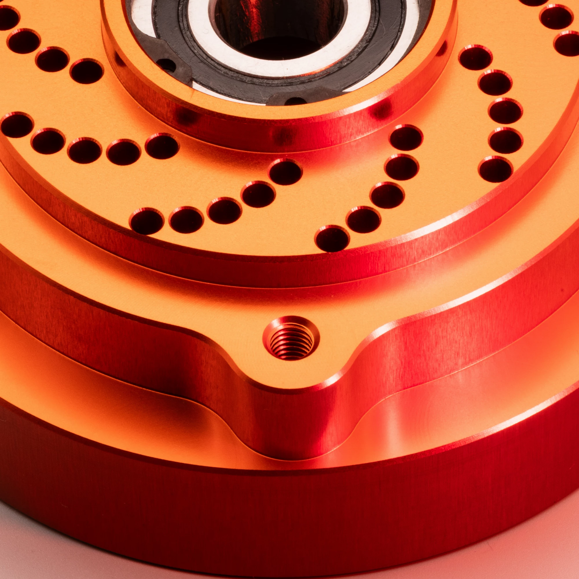 CNC Hinterradmitnehmer Kettenrad verstärkt orange CNC Hinterradmitnehmer Kettenrad verstärkt orange