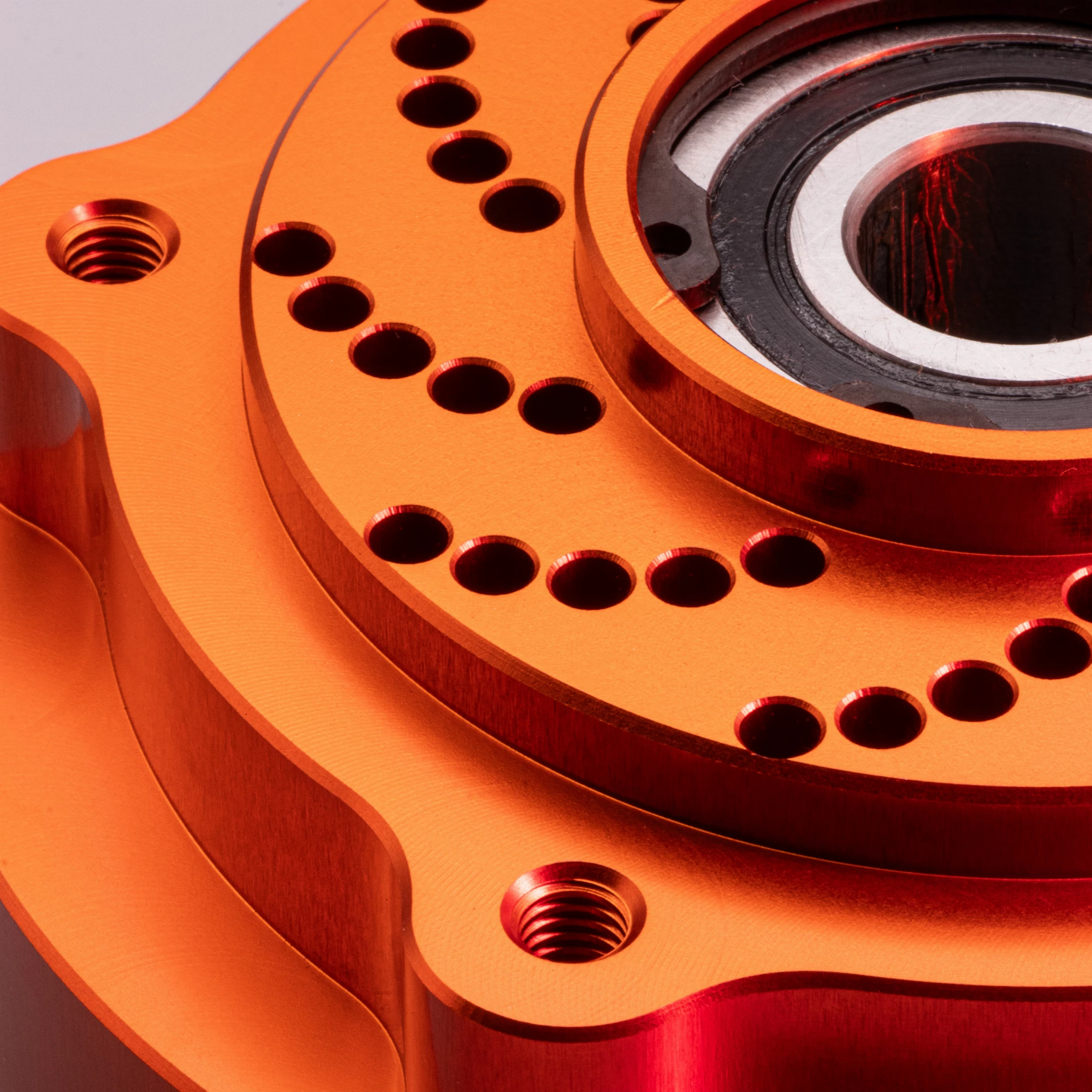 CNC Hinterradmitnehmer Kettenrad verstärkt orange CNC Hinterradmitnehmer Kettenrad verstärkt orange